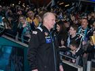 Ken Hinkley, Senior Coach of the Power  follows his team out the race.