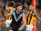 ADELAIDE, AUSTRALIA - SEPTEMBER 13: Mitch Georgiades of the Power celebrates a goal during the 2024 AFL Second Semi Final match between the Port Adelaide Power and the Hawthorn Hawks at Adelaide Oval on September 13, 2024 in Adelaide, Australia. (Photo by Sarah Reed/AFL Photos via Getty Images)