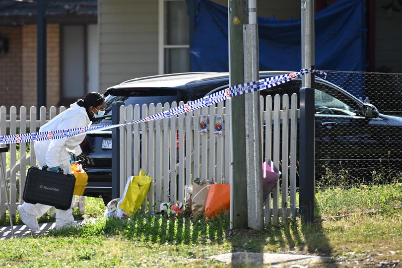 Tributes can be seen as as police forensic officers continue to work the scene where two young boys were found stabbed in the Blue Mountains village of Faulconbridge west of Sydney, Wednesday, September 11, 2024. The mother of two boys found dead in the Blue Mountains remains under police guard, the boys, aged nine and 11, were discovered on Tuesday at their Faulconbridge home, west of Sydney. (AAP Image/Dean Lewins) NO ARCHIVING