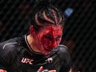 Irena Aldana’s face was a mask of blood during the fight.