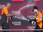 Oscar Piastri (right) sprays McLaren chief engineer Tom Stallard with champers after his Baku win.