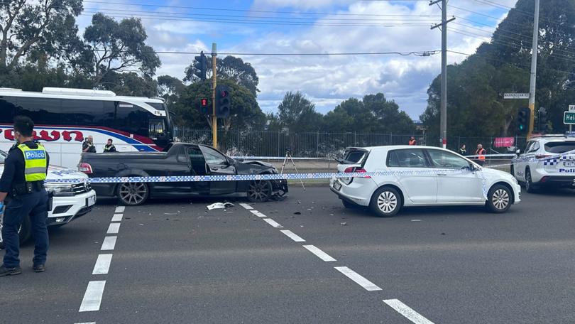 A gun has been fired at an intersection in Melbourne’s northeast after two cars collided.