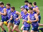 GEELONG, AUSTRALIA - SEPTEMBER 16: Tom Hawkins of the Cats runs laps with team mates during a Geelong Cats AFL training session at GMHBA Stadium on September 16, 2024 in Geelong, Australia. (Photo by Quinn Rooney/Getty Images)