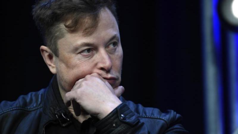 Elon Musk has deleted a post making reference to assassinating Kamala Harris and Joe Biden. (AP PHOTO)