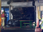 A car has been driven into a barber shop in Melbourne’s north and has gone up in flames.