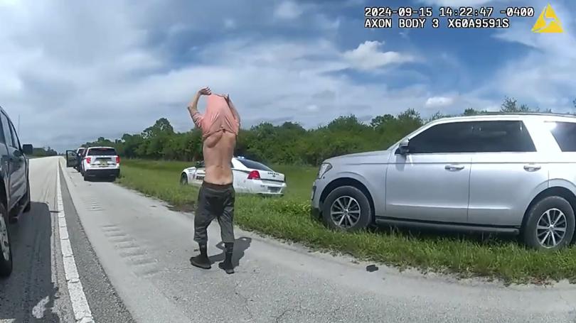 In this image taken from police body camera video and released by the Martin County, Florida Sheriff’s Office, law enforcement officers prepare to arrest Ryan Routh, the man suspected in the apparent assassination attempt of Donald Trump, Sunday, Sept. 15, 2024.