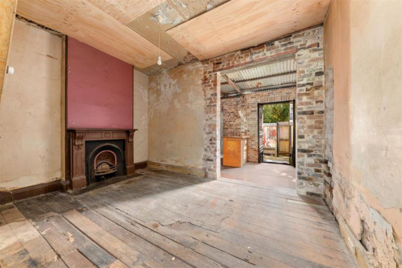 The bidders at the auction fo 12 Chapman Street hoped to renovate the well-positioned home and move in.