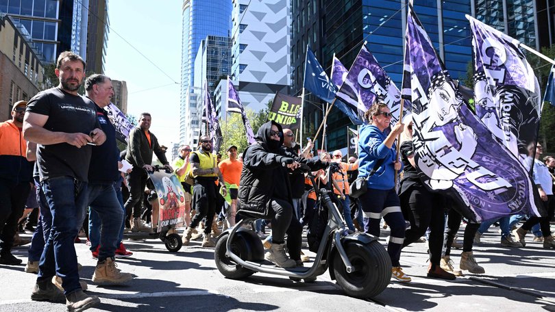 Protesters are seen during a Construction, Forestry and Maritime Employees Union (CFMEU) rally, in Melbourne,