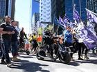 Protesters are seen during a Construction, Forestry and Maritime Employees Union (CFMEU) rally, in Melbourne,