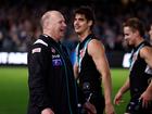 Ken Hinkley taunting Hawthorn players after the game.