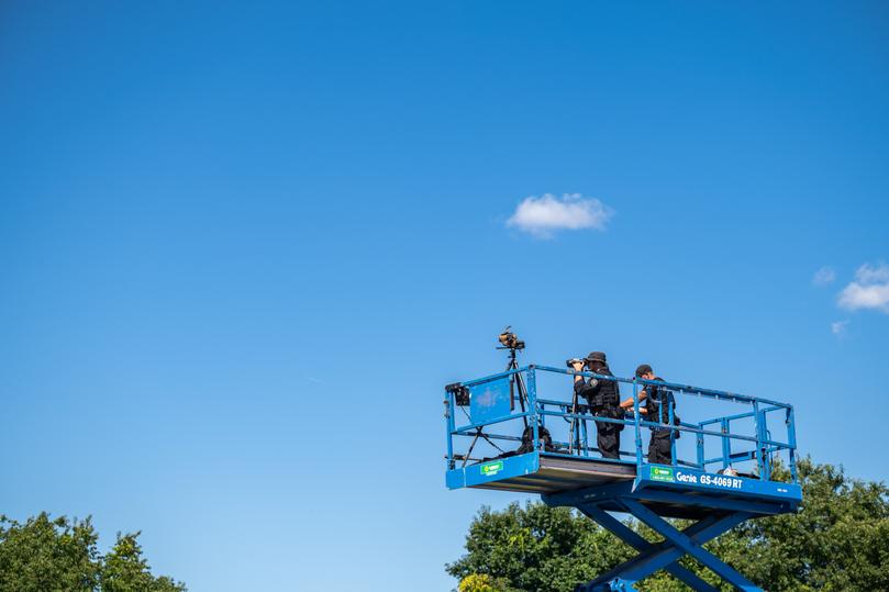 Secret Service agents keep watch during a campaign rally for Kamala Harris in North Hampton, N.H. 