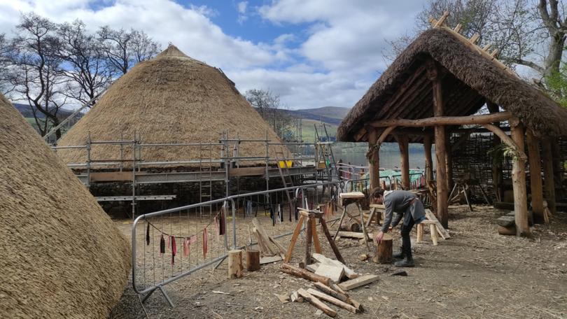 The recreated huts on Loch Tay.