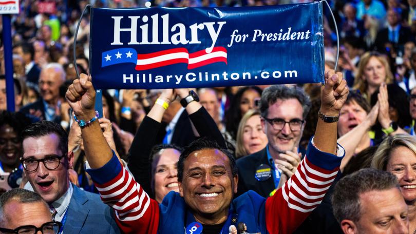 A delegate holds up a Hillary-for-president sign at the 2024 (yes, 2024) Democratic convention. MUST CREDIT: Demetrius Freeman/The Washington Post