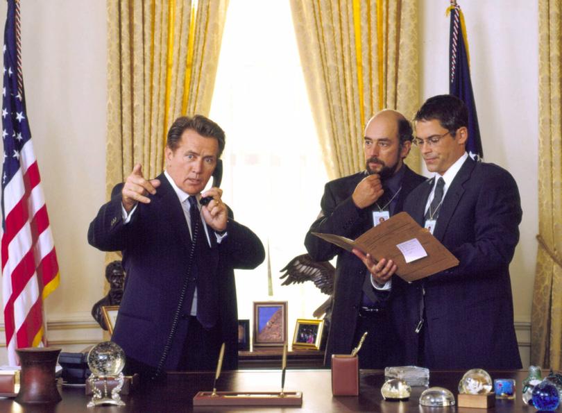 Martin Sheen, left, as President Josiah Bartlet, appears in a scene from NBC's "The West Wing" with co-stars Richard Schiff and Rob Lowe, right. The hit drama series is a leading contender for honors at the Primetime Emmy Awards, which airs on CBS at 8 p.m, EDT, Sunday evening, Oct. 7, 2001. 