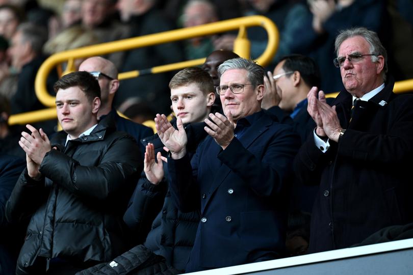 Keir Starmer applauds prior to the Premier League match between Wolverhampton Wanderers and Arsenal FC in April.