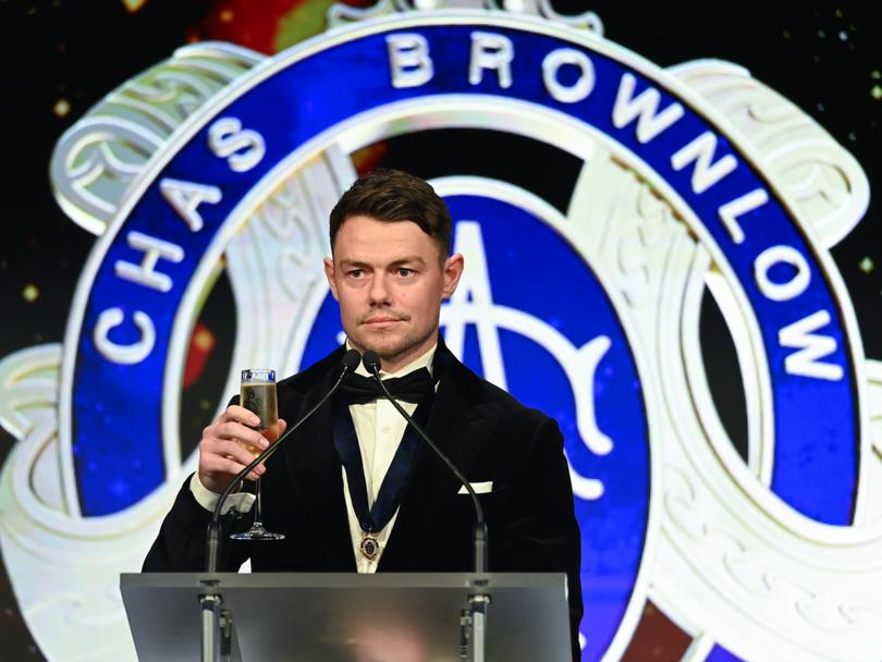 Lachie Neale of the Lions gives a speech after being awarded the 2023 Brownlow Medal.