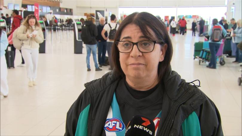 Pina Tridente paid $700 to get another flight to Sydney for the preliminary finals.