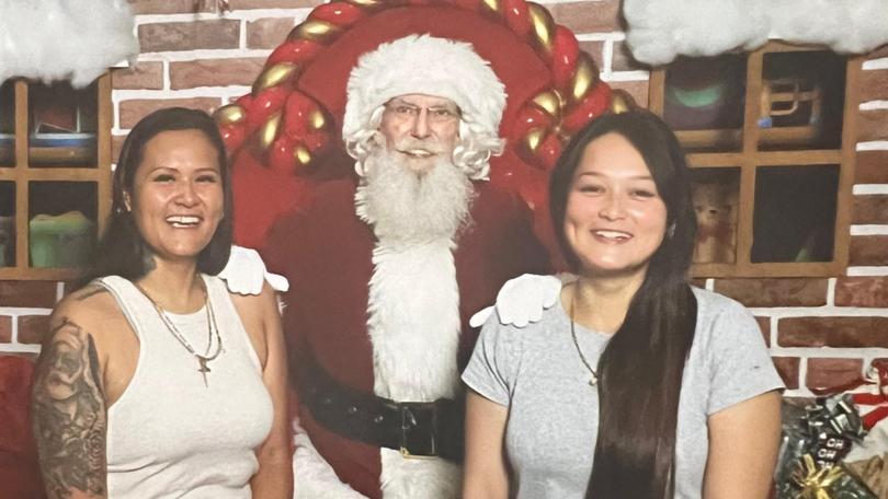 Angie (left), Santa and her younger sister Jessica (right) just a few weeks before she vanished.