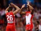 SYDNEY, AUSTRALIA - SEPTEMBER 20: Luke Parker (left) and Joel Amartey of the Swans celebrate during the 2024 AFL First Preliminary Final match between the Sydney Swans and the Port Adelaide Power at The Sydney Cricket Ground on September 20, 2024 in Sydney, Australia. (Photo by Michael Willson/AFL Photos via Getty Images)