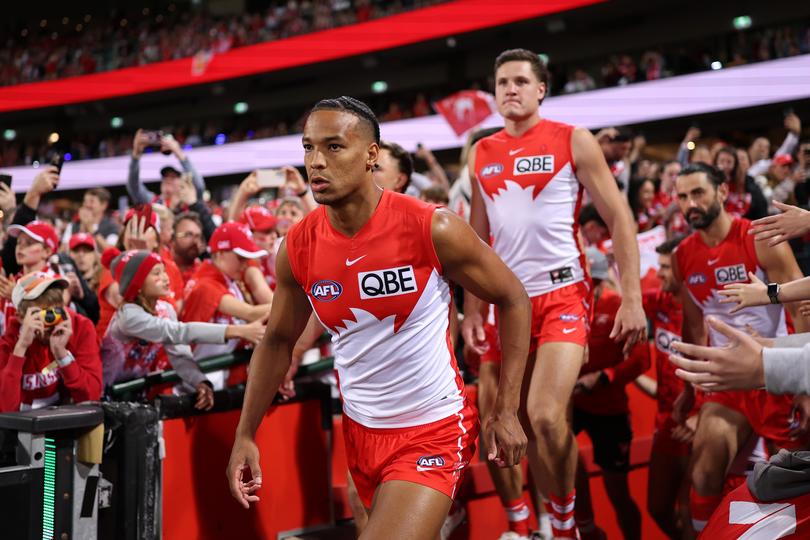 SYDNEY, AUSTRALIA - SEPTEMBER 20: Joel Amartey of the Swans runs out onto the field during the AFL Preliminary Final match between Sydney Swans and Port Adelaide Power at Sydney Cricket Ground, on September 20, 2024, in Sydney, Australia. (Photo by Cameron Spencer/Getty Images)