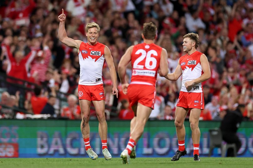 SYDNEY, AUSTRALIA - SEPTEMBER 20: Isaac Heeney of the Swans celebrates kicking a goal during the AFL Preliminary Final match between Sydney Swans and Port Adelaide Power at Sydney Cricket Ground, on September 20, 2024, in Sydney, Australia. (Photo by Cameron Spencer/Getty Images)