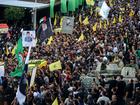 Hezbollah supporters carry the coffin of a victim who was killed in electronic pagers explosion, during a funeral procession in Beirut southern suburb. Thousands people were wounded in the cyberattack and 12 were killed so far in the latest toll announced by the ministry of health. 