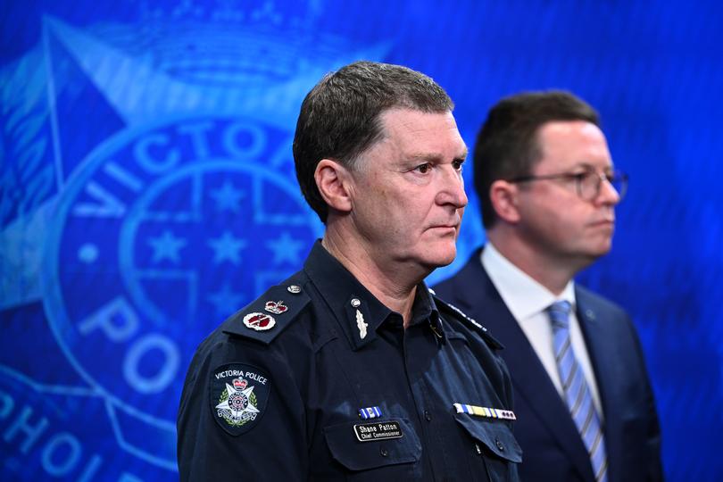 Victoria Police Chief Commissioner Shane Patton (left) and Victorian Minister for Police Anthony Carbines during a press conference in Melbourne, Saturday, September 9, 2023. Police have ruled out any terror links after a car rammed pedestrians and other vehicles in Melbourne's CBD, killing one person and injuring five others. (AAP Image/Joel Carrett) NO ARCHIVING