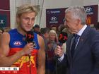 Kai Lohmann speaks to legendary commentator Bruce McAvaney after Brisbane’s epic prelim win over Geelong. 