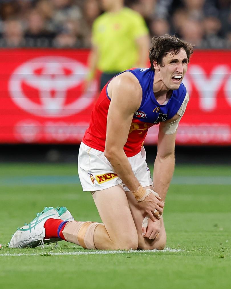 MELBOURNE, AUSTRALIA - SEPTEMBER 21: Oscar McInerney of the Lions is seen injured during the 2024 AFL Second Preliminary Final match between the Geelong Cats and the Brisbane Lions at The Melbourne Cricket Ground on September 21, 2024 in Melbourne, Australia. (Photo by Dylan Burns/AFL Photos via Getty Images)