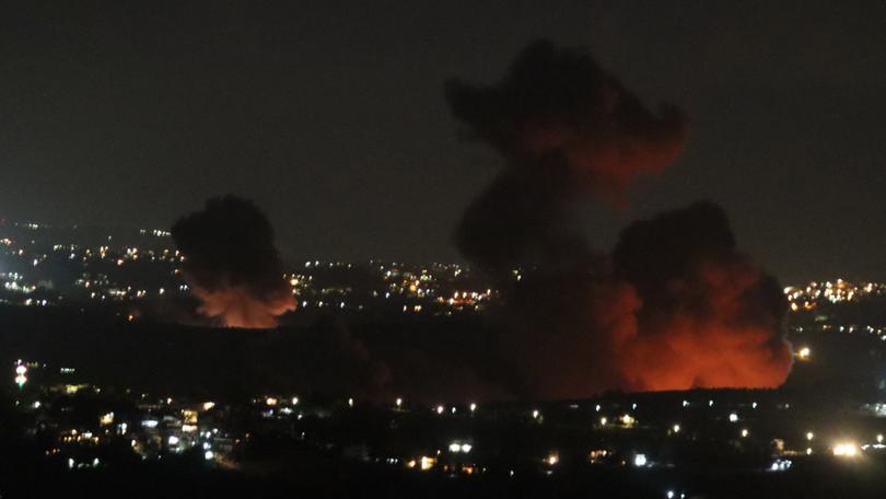 The Israeli Defense Forces said they are 'striking targets belonging to the Hezbollah' in Lebanon. 
Smoke billows from the site of an Israeli airstrike that targeted Lebanese village of Zawtar.