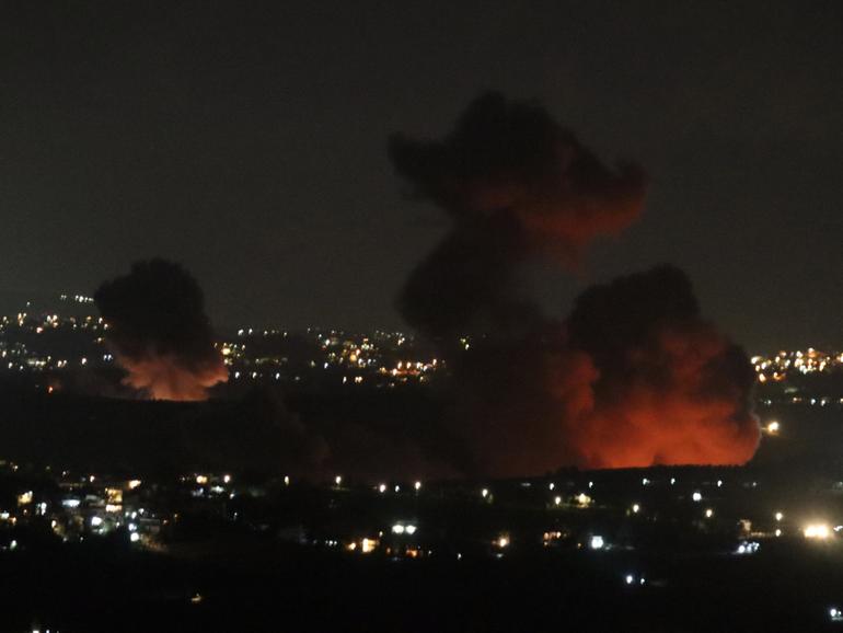 The Israeli Defense Forces said they are 'striking targets belonging to the Hezbollah' in Lebanon. 
Smoke billows from the site of an Israeli airstrike that targeted Lebanese village of Zawtar.