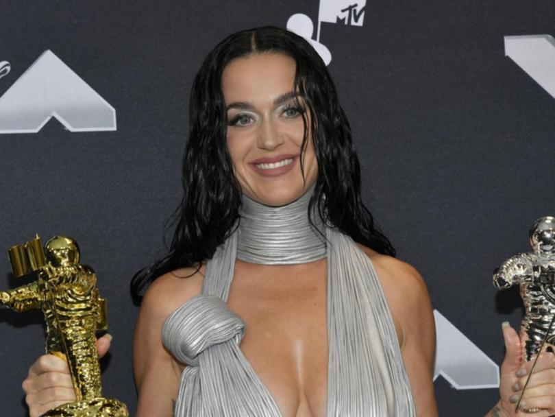 Katy Perry poses with MTV Video Music Award trophies