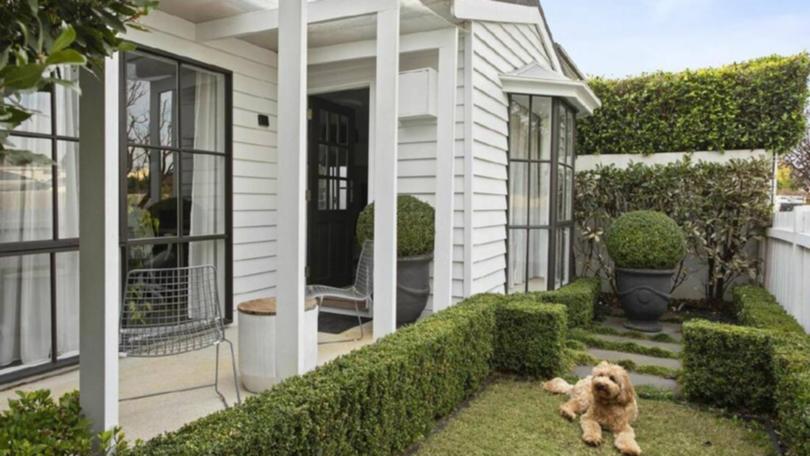 This property at 13 Railway Parade, Newport, in Victoria, featured a cute Cavoodle and sold well above the listing price.