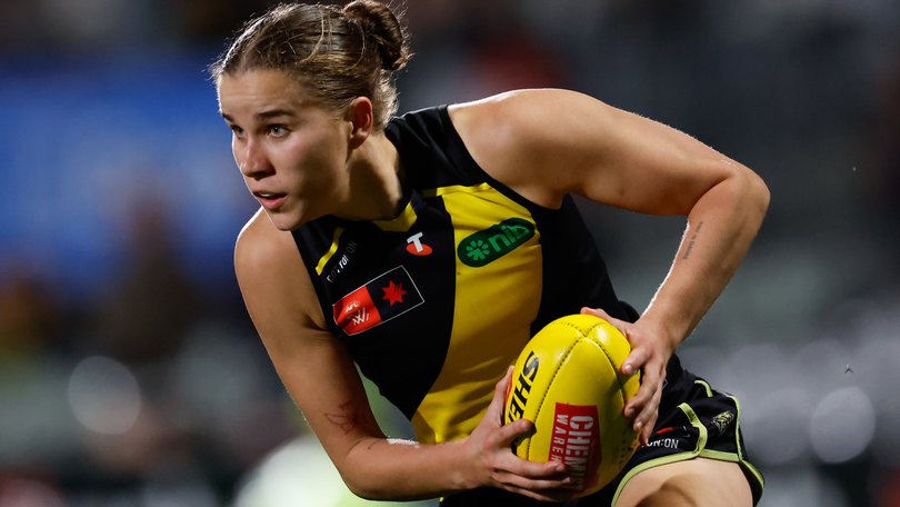 Richmond star Ellie McKenzie has escaped an AFLW ban after her rough conduct charge was downgraded.