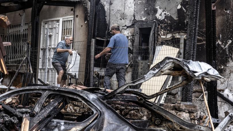 Moti Fitch, 75, outside his damaged home in Moreshet. MUST CREDIT: Heidi Levine for The Washington Post