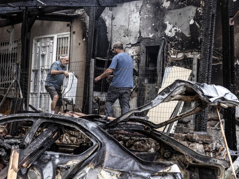 Moti Fitch, 75, outside his damaged home in Moreshet. MUST CREDIT: Heidi Levine for The Washington Post