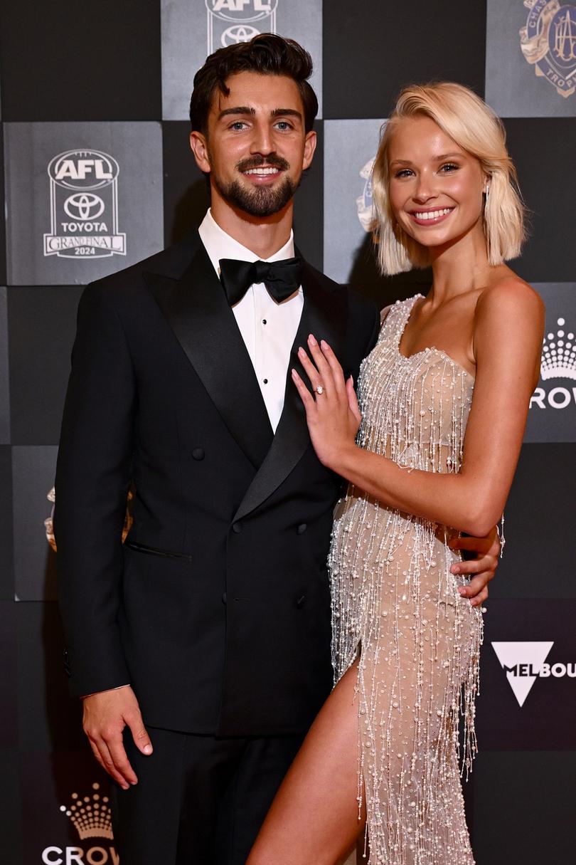 MELBOURNE, AUSTRALIA - SEPTEMBER 23: Josh Daicos of the Collingwood Magpies and partner Annalise Dalins arrive ahead of the 2024 Brownlow Medal at Crown Palladium on September 23, 2024 in Melbourne, Australia. (Photo by Quinn Rooney/Getty Images)