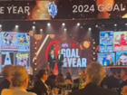 Harley Reid of the Eagles is presented the NAB AFL Goal of the Year by Chris Judd.