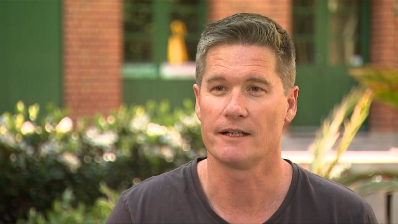 Chris McDougall, pictured, says his twin brother Greg is ‘Superman’ to his family.
