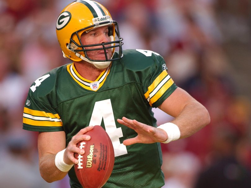 LANDOVER, MD - OCTOBER 31:  Brett Favre #4 of the Green Bay Packers looks to throw a pass during an NFL football game against the Washington Redskins on October 31, 2004 at FedEx Field in Landover, Maryland.. (Photo by Mitchell Layton/Getty Images)