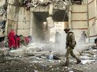 Ukrainian rescuers work at the site of a shelling on a high-storey residential building in Kharkiv, northeastern Ukraine, 24 September 2024, amid the ongoing Russian invasion. 