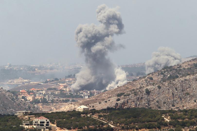 Smoke billows from a site targeted by Israeli shelling in the southern Lebanese village of Khiam on September 23, 2024. - The Israeli military on September 23 told people in Lebanon to move away from Hezbollah targets and vowed to carry out more "extensive and precise" strikes against the Iran-backed group. (Photo by Rabih DAHER / AFP)