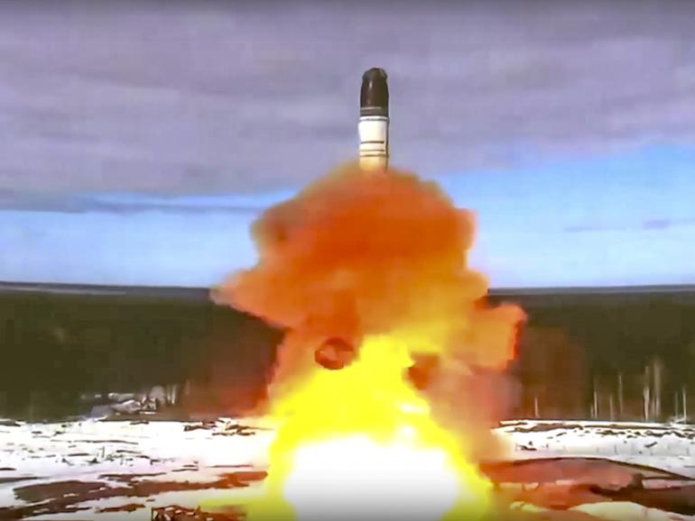 Russia launching its Sarmat intercontinental ballistic missile in a 2022 test.