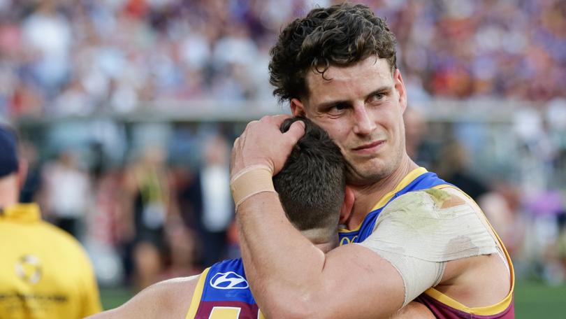 MELBOURNE, AUSTRALIA - SEPTEMBER 30: Dayne Zorko and Jarrod Berry of the Lions look dejected during the 2023 AFL Grand Final match between the Collingwood Magpies and the Brisbane Lions at the Melbourne Cricket Ground on September 30, 2023 in Melbourne, Australia. (Photo by Russell Freeman/AFL Photos)