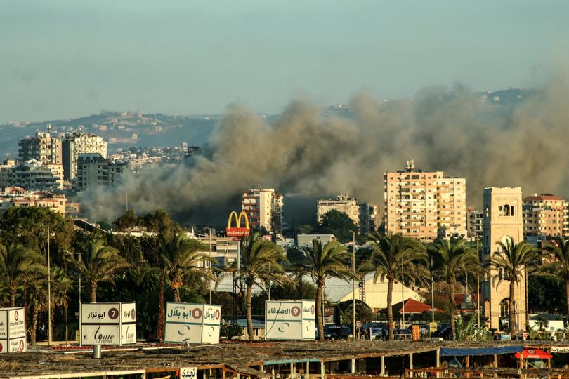 Smoke billows from the site of an Israeli airstrike on the area of Burj al-Shamali in southern Lebanon on September 25, 2024. - Lebanon's health minister said 51 people were killed and more than 220 injured on September 25, on the third day of major Israeli raids across the country. (Photo by AFP) -