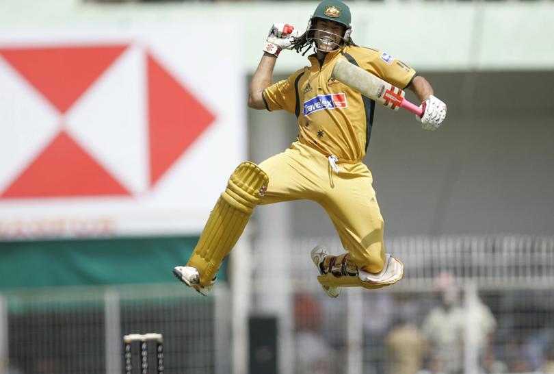 Australia's Andrew Symonds reacts after scoring a century.