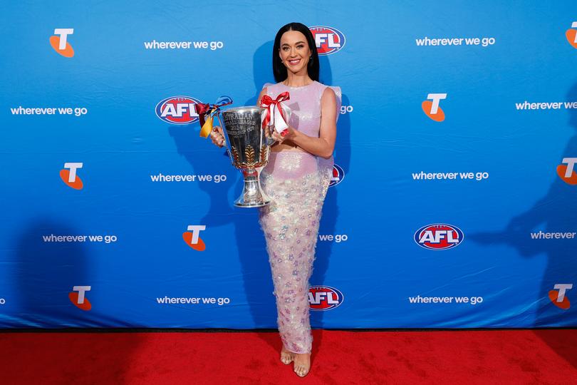 Katy Perry with the premiership cup.