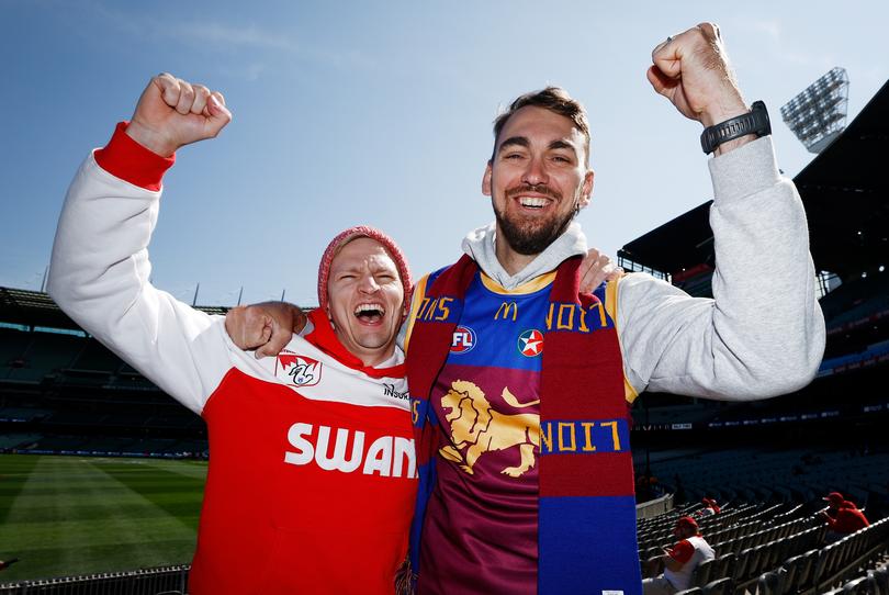 A Swans fan and a Lions fan.