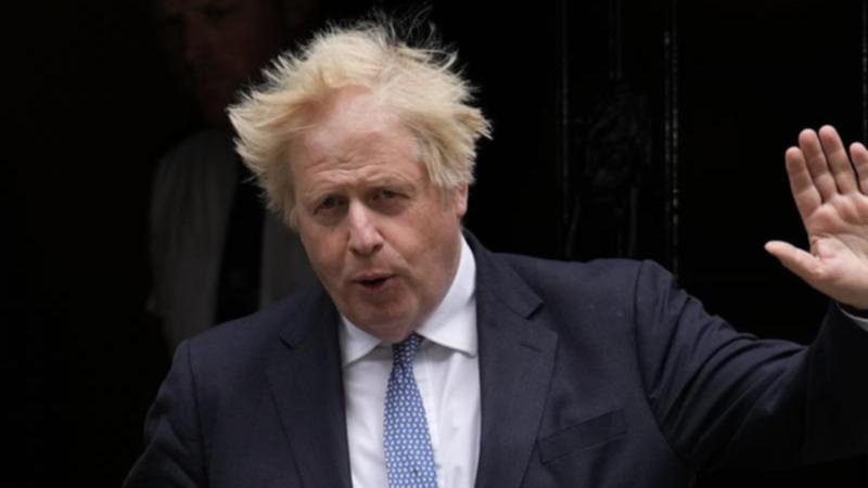 Boris Johnson says the idea of an army raid on a Dutch factory over COVID-19 vaccines was "nuts". (AP PHOTO)