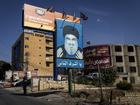 A billboard depicting Hassan Nasrallah, the Hezbollah leader, seen from the streets of the Bekaa Valley in Lebanon.